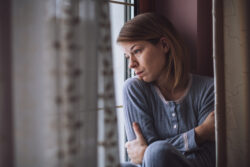 Woman looking out the window